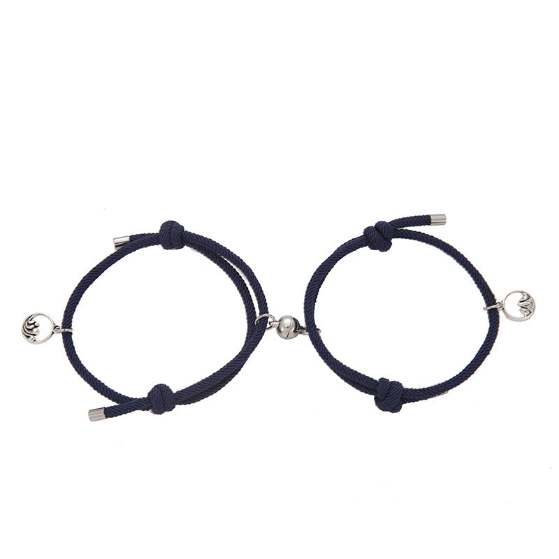 Two navy blue New Alloy Eachother Couple Bracelets with silver beads on a white background